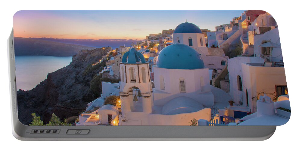 Sunset Portable Battery Charger featuring the photograph The three blue domes of Oia by Matt McDonald