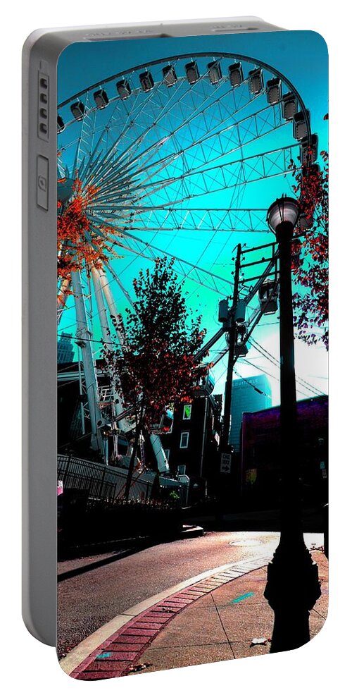 Atlanta Portable Battery Charger featuring the photograph The Wheel Blue by D Justin Johns