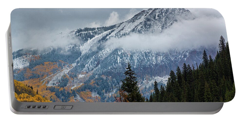 Aspen Portable Battery Charger featuring the photograph Through The Clouds by John De Bord