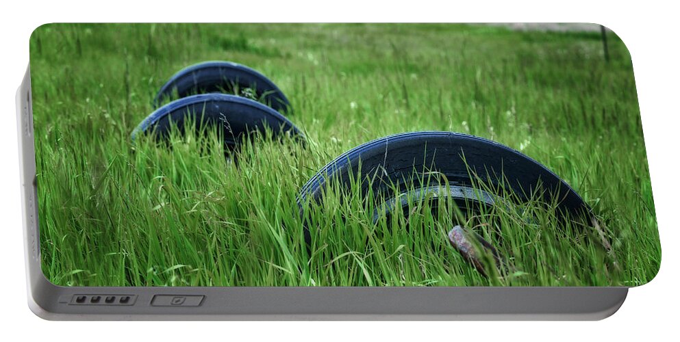 Tires Portable Battery Charger featuring the photograph Tires - Grassy Field by Nikolyn McDonald