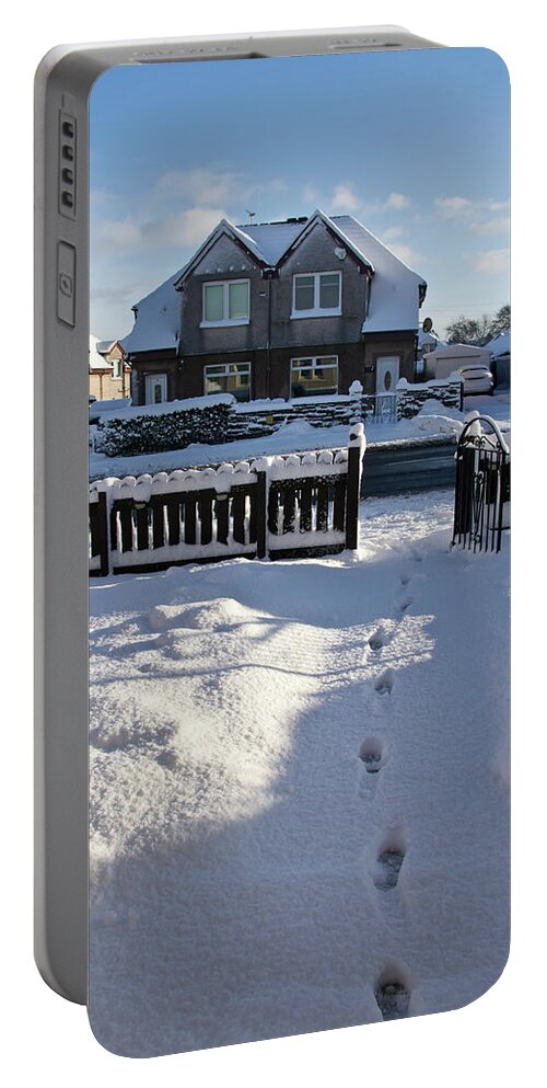 Snow Portable Battery Charger featuring the photograph Traces on snow. by Elena Perelman