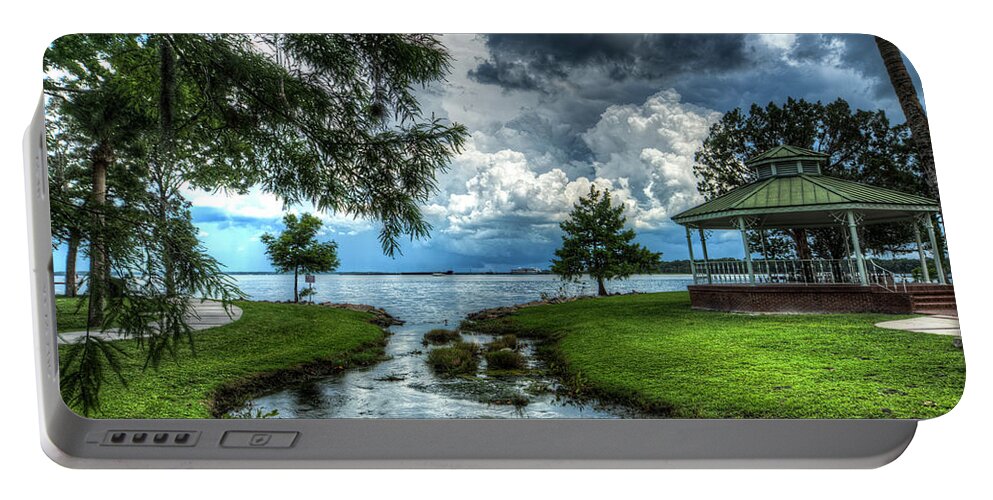 Green Cove Springs Portable Battery Charger featuring the photograph Chaotic Tranquility by Joseph Desiderio