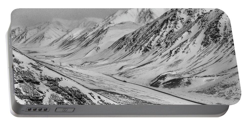 Antigun Pass Portable Battery Charger featuring the photograph Transiting the Mountain Pass by John Roach