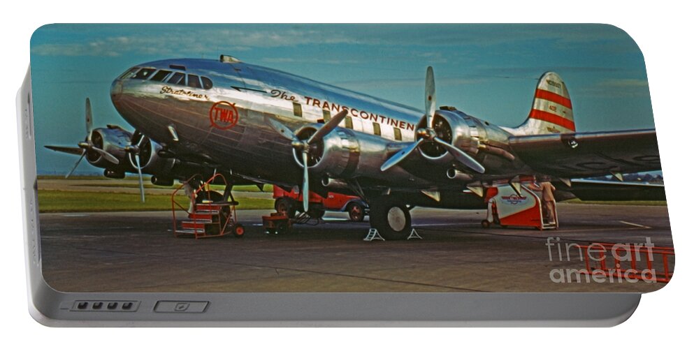 Historic Airplane Portable Battery Charger featuring the photograph TWA Stratoliner The Transcontinental Line by Henry Boris by Rolf Bertram