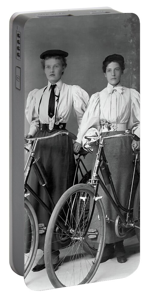 Gift Portable Battery Charger featuring the photograph Two Young Ladies with their Bicycles circa 1895 by Anthony Murphy