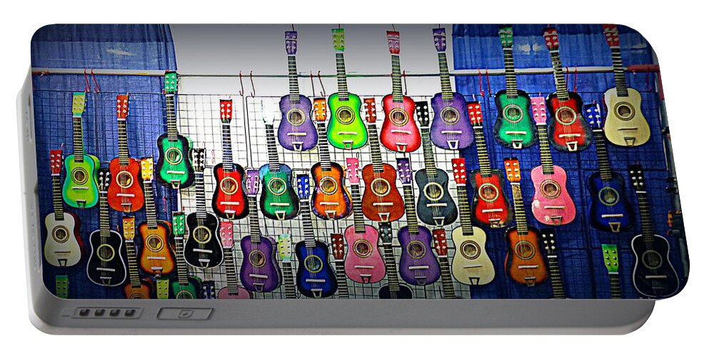 Music Portable Battery Charger featuring the photograph Ukuleles at the Fair by Lori Seaman