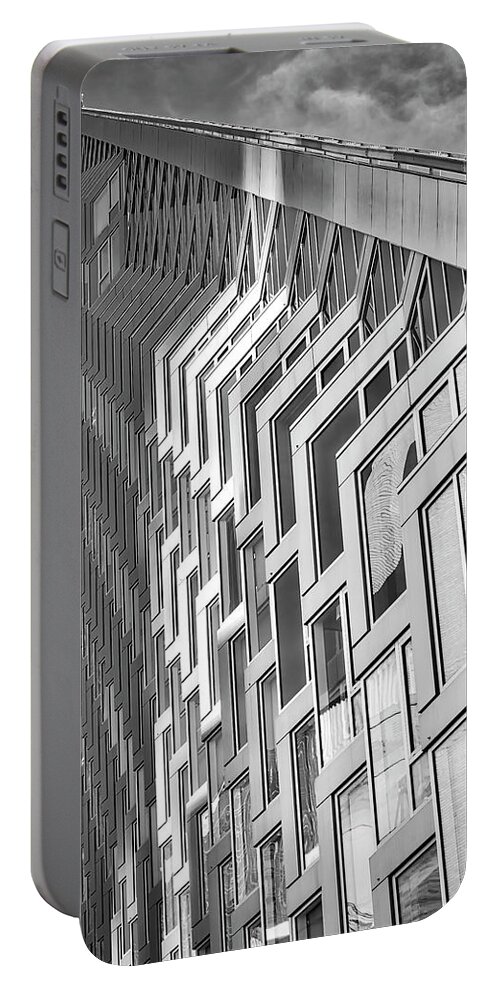625 West 57th Street Portable Battery Charger featuring the photograph Upward View to West 57 ST NYC BW by Susan Candelario