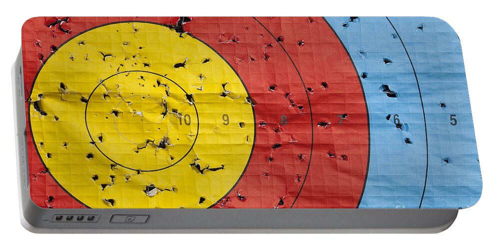 Archery Portable Battery Charger featuring the photograph Used archery target close up by Simon Bratt