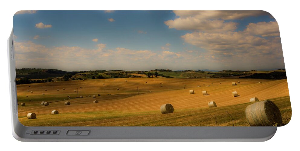 Tuscany Portable Battery Charger featuring the photograph Val d'Orcia field with hay balls by Wolfgang Stocker