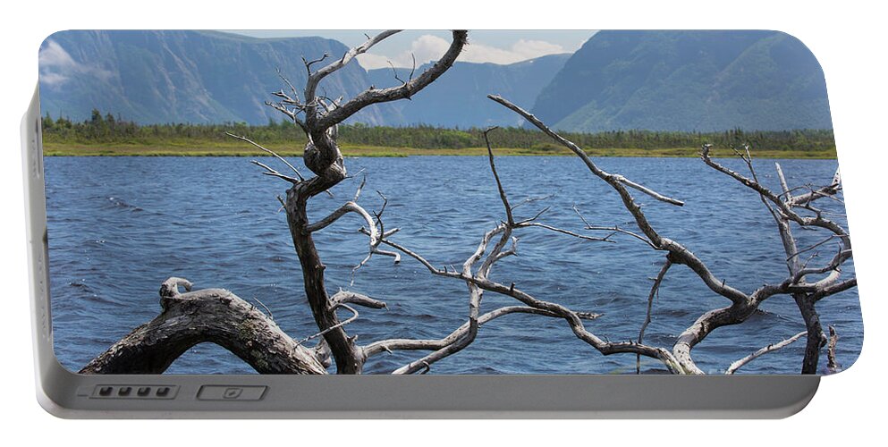 Western Brook Pond Portable Battery Charger featuring the photograph View across the water by Agnes Caruso