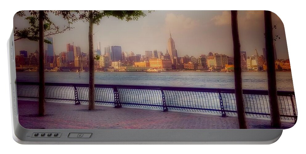 On The Waterfront Portable Battery Charger featuring the photograph View of Manhattan from Hoboken by Miriam Danar