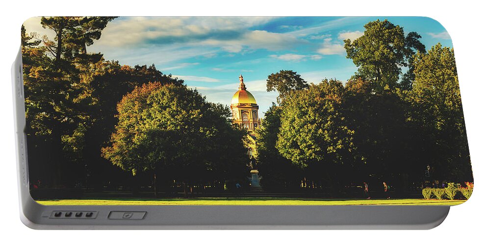University Of Notre Dame Portable Battery Charger featuring the photograph View Of The Golden Dome - University Of Notre Dame by Mountain Dreams