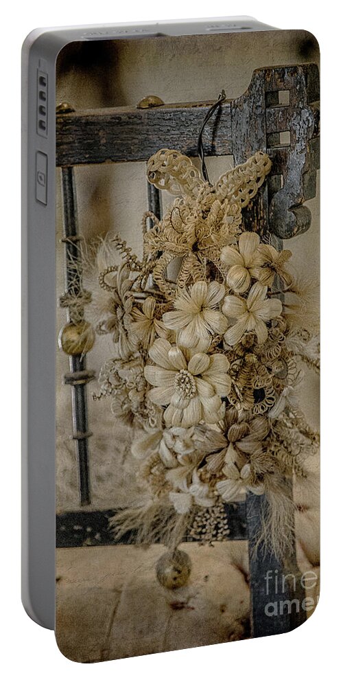 Antique Portable Battery Charger featuring the photograph Vintage Floral Swag on a Bedpost by Teresa Wilson