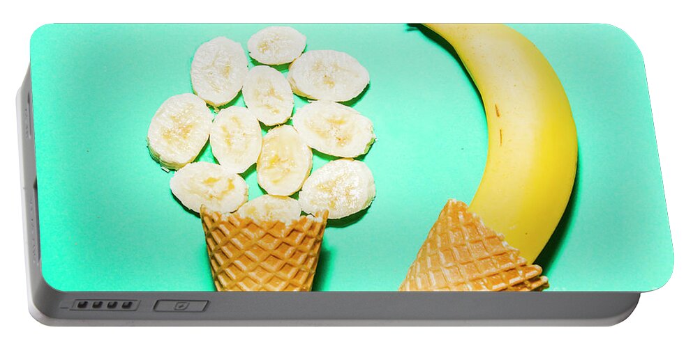 Summer Portable Battery Charger featuring the photograph Waffle cones with fresh banana by Jorgo Photography