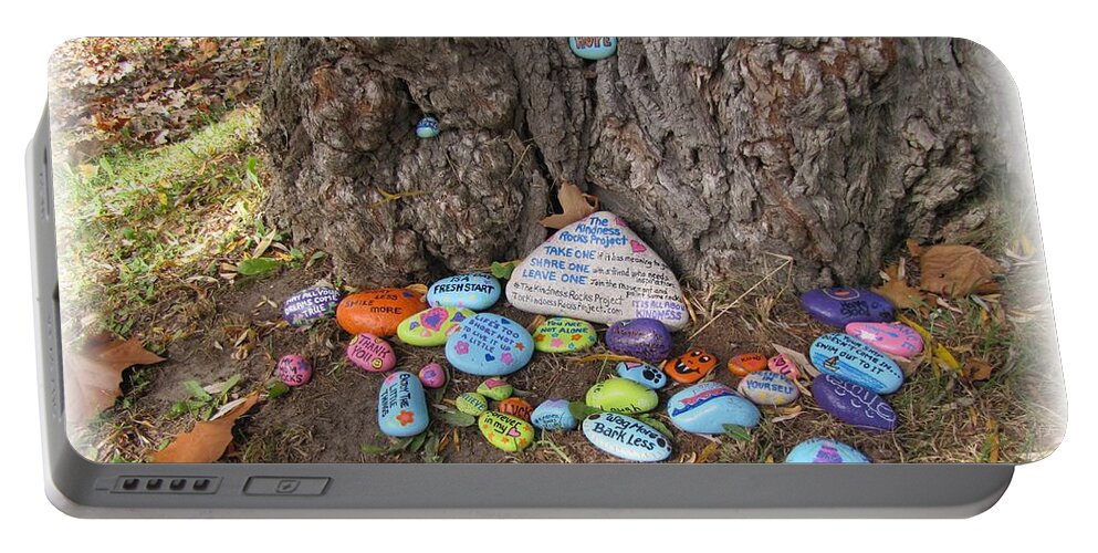 The Kindness Rocks Project Portable Battery Charger featuring the photograph Wag More, Bark Less by Maciek Froncisz