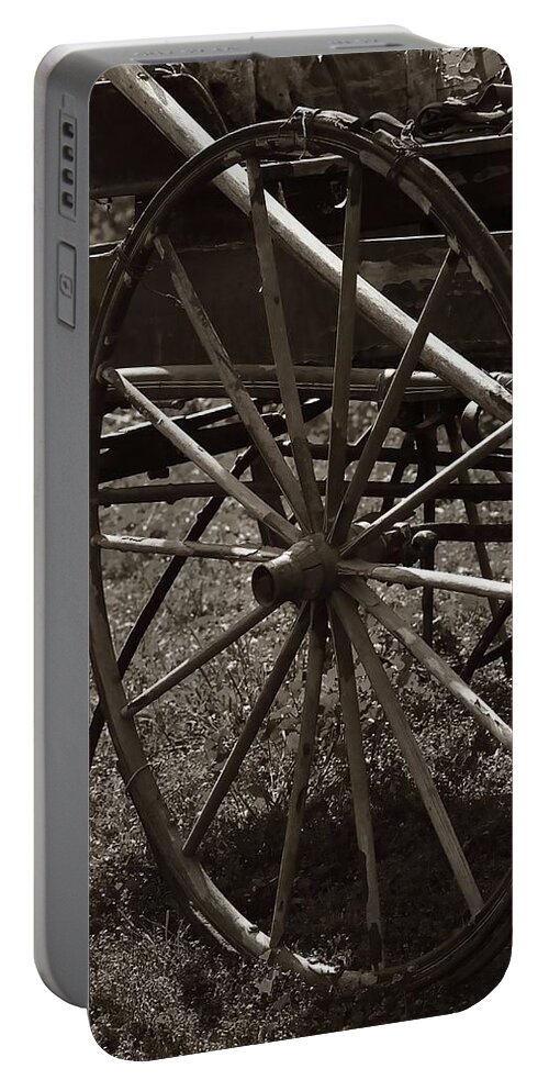 Black Portable Battery Charger featuring the photograph Wagon and Wheel by Amanda Smith