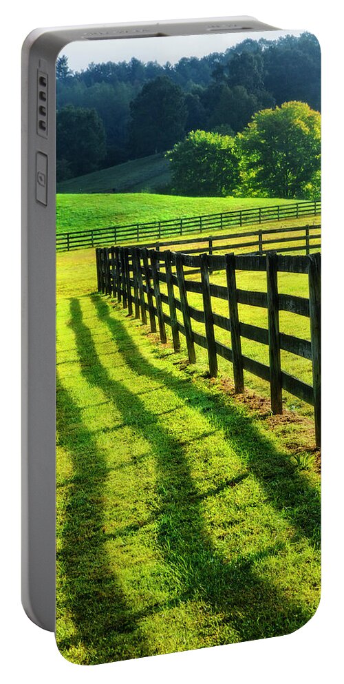 Appalachia Portable Battery Charger featuring the photograph Walk along the Fence Shadows by Debra and Dave Vanderlaan
