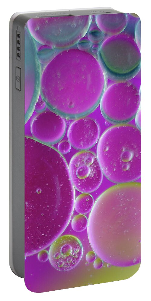Water Portable Battery Charger featuring the photograph Water and oil bubbles by Andy Myatt