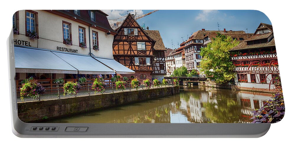 Strasbourg Portable Battery Charger featuring the photograph water canal in Strasbourg, France by Ariadna De Raadt