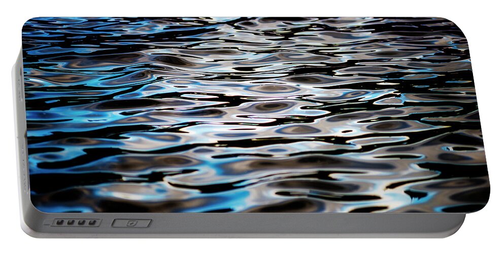 Water Portable Battery Charger featuring the photograph Water Ripples by Pelo Blanco Photo