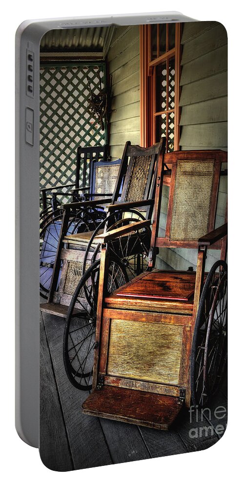 Photography Portable Battery Charger featuring the photograph Wheelchairs of Yesteryear by Kaye Menner by Kaye Menner