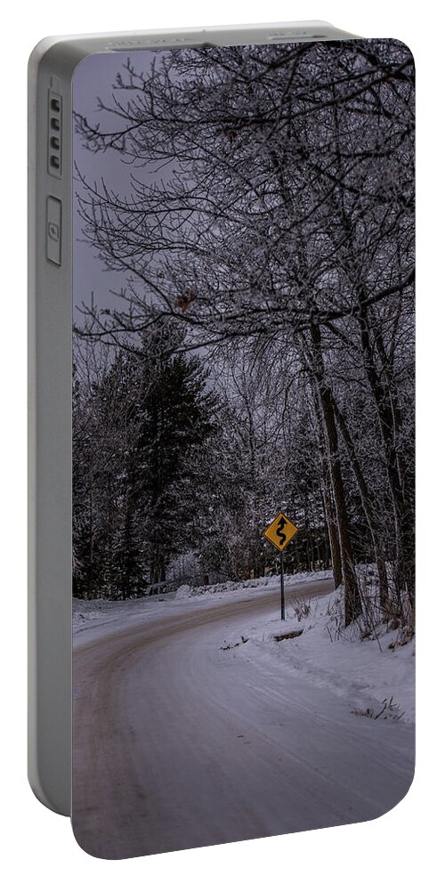Road Portable Battery Charger featuring the photograph Winding Winter Road by Paul Freidlund