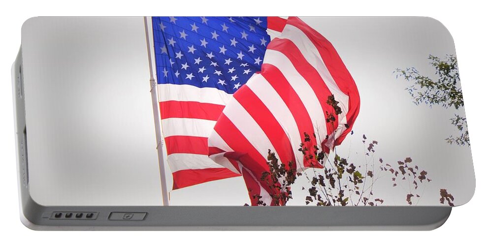 Flag Flying Portable Battery Charger featuring the photograph Long may it wave by Chuck Brown