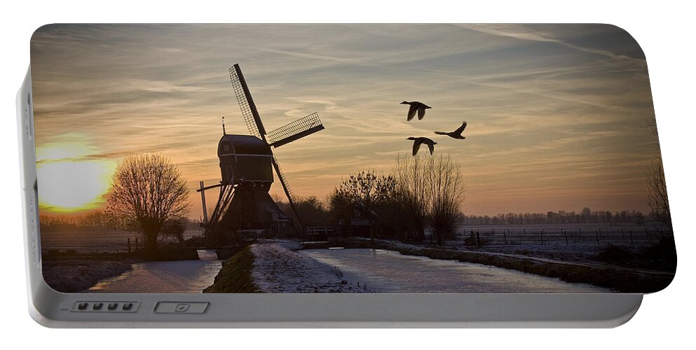 Dutch Portable Battery Charger featuring the photograph Winter in Holland-1 by Casper Cammeraat