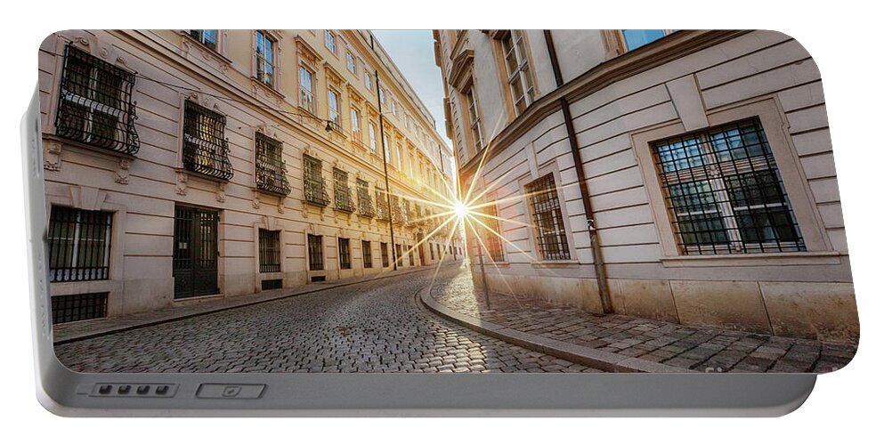 Outdoor Portable Battery Charger featuring the photograph winter sun between two buildings in Vienna by Ariadna De Raadt