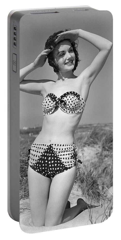 1950s Portable Battery Charger featuring the photograph Woman In Bikini, C.1950s by H. Armstrong Roberts/ClassicStock