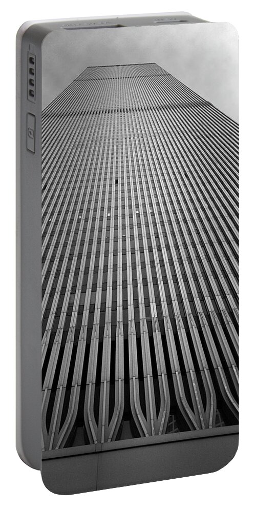 Lower Manhattan Portable Battery Charger featuring the photograph World Trade Center NYC Base of the South Tower 1985 by Kathy Anselmo