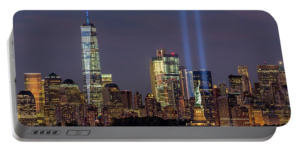 September 11 Portable Battery Charger featuring the photograph World Trade Center WTC Tribute In Light Memorial by Susan Candelario