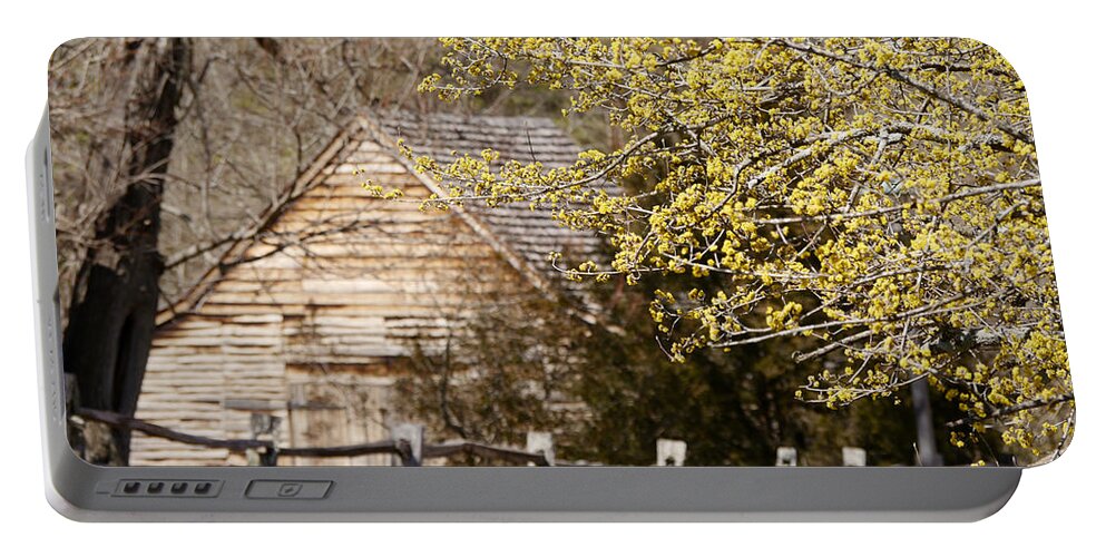 Colonial Williamsburg Portable Battery Charger featuring the photograph Yellow Blooms in Williamsburg by Rachel Morrison