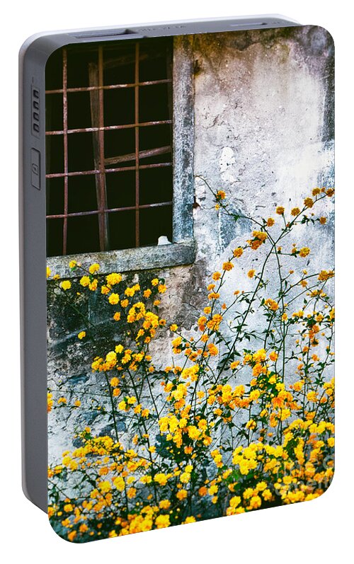 Abandoned Portable Battery Charger featuring the photograph Yellow Flowers And Window by Silvia Ganora