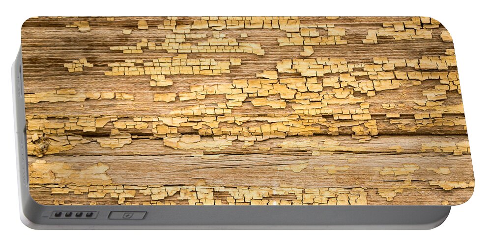 Abstract Portable Battery Charger featuring the photograph Yellow Painted Aged Wood by John Williams