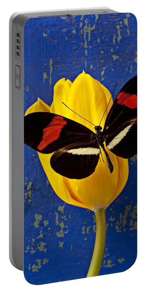 Yellow Portable Battery Charger featuring the photograph Yellow Tulip With Orange and Black Butterfly by Garry Gay