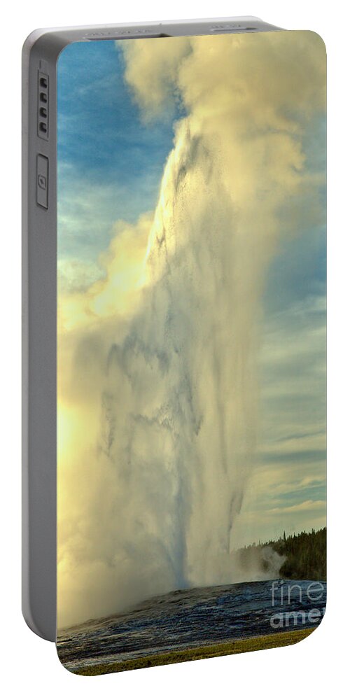 Old Faithful Portable Battery Charger featuring the photograph Yellowstone Old Faithful Sunset Eruption by Adam Jewell