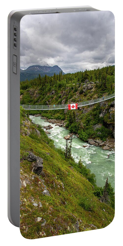 Yukon Suspension Bridge Portable Battery Charger featuring the photograph Yukon Suspension Bridge by Anthony Jones
