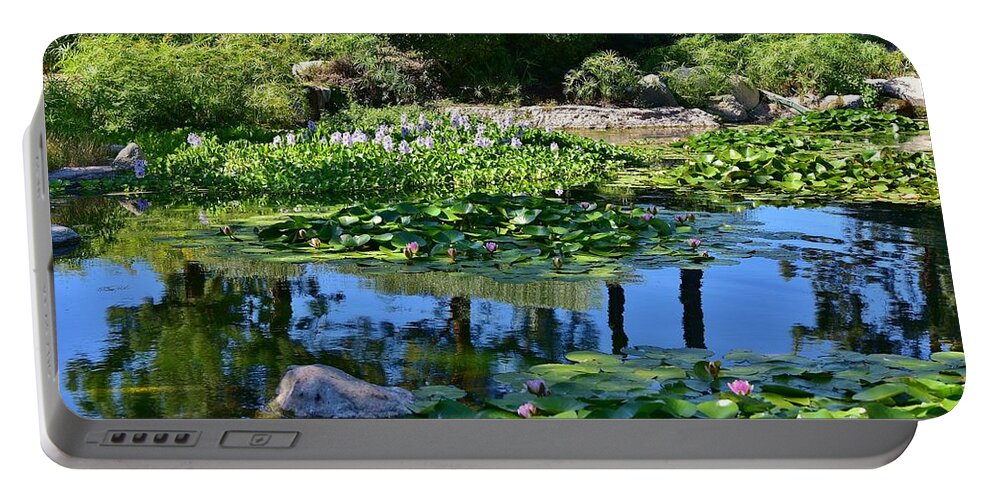 Linda Brody Portable Battery Charger featuring the photograph Zen-Like 10 Pond Flowers and Reflections by Linda Brody