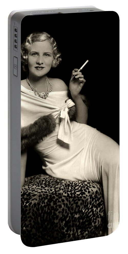 Ziegfeld Portable Battery Charger featuring the photograph Ziegfeld Model reclining in evening dress holding cigarette by Alfred Cheney Johnston by Vintage Collectables