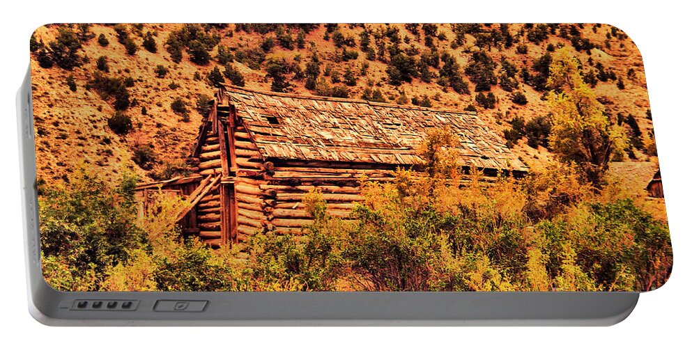 Barn Portable Battery Charger featuring the photograph Log barn #1 by Jeff Swan