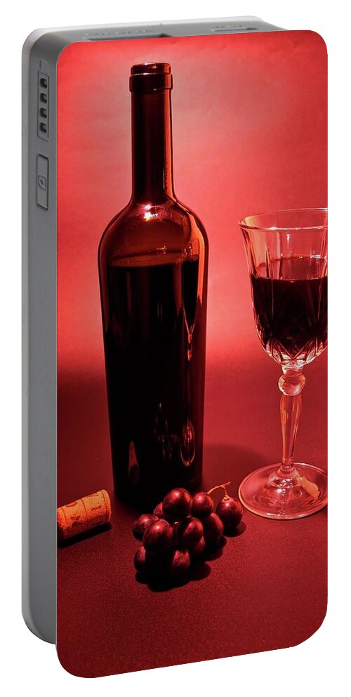 Red Portable Battery Charger featuring the photograph Red wine display #1 by Martin Smith