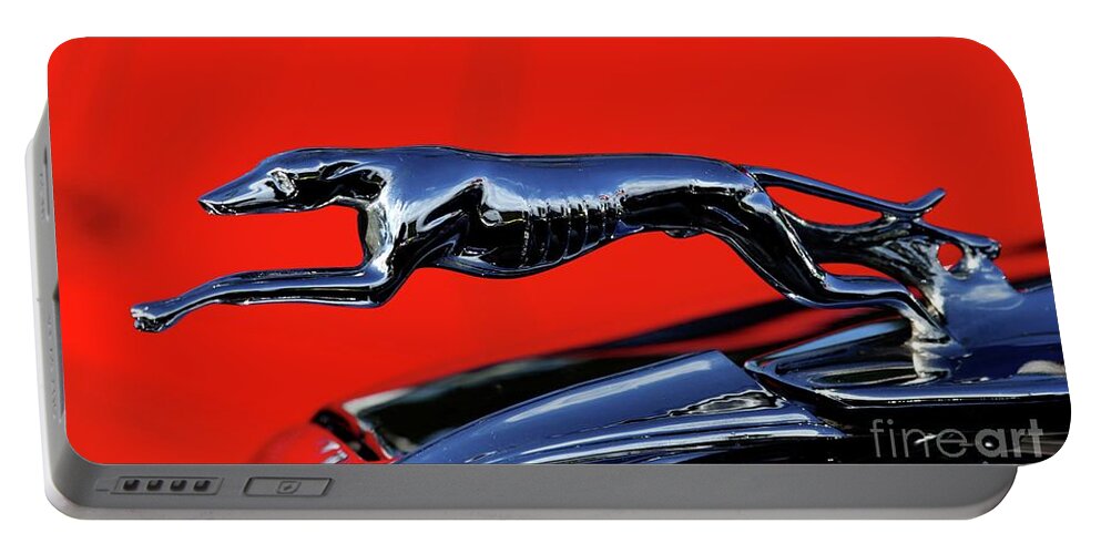 1934 Ford Hood Ornament Portable Battery Charger featuring the photograph 1934 Ford by Terri Brewster