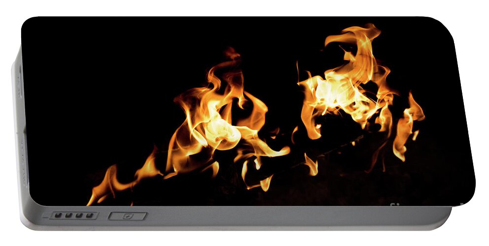 Background Portable Battery Charger featuring the photograph Flames in the fire of a red and yellow barbecue. #3 by Joaquin Corbalan