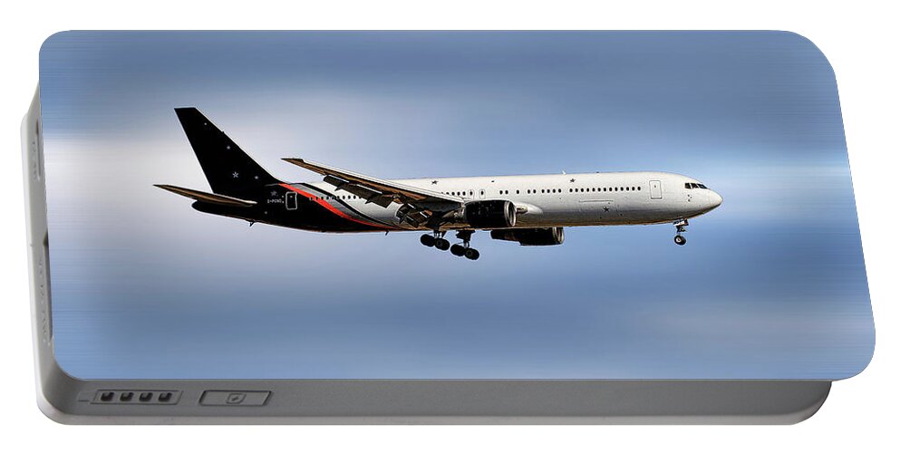 Titan Portable Battery Charger featuring the mixed media Titan Airways Boeing 767-36N by Smart Aviation