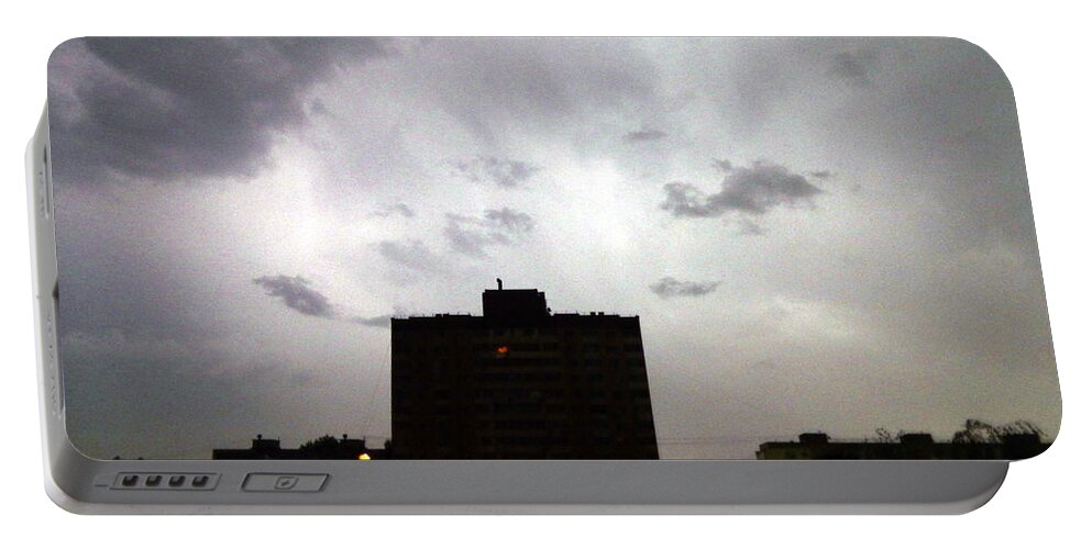 Storm Portable Battery Charger featuring the photograph Lightning and thunder at night in the city it's raining #6 by Oleg Prokopenko