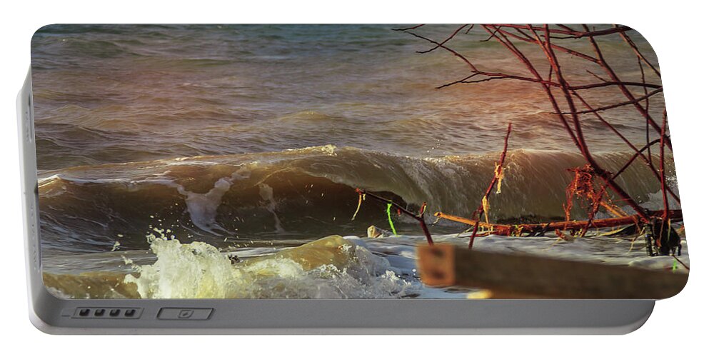 Wave Portable Battery Charger featuring the photograph a beautiful afternoon on Kampung Nelayan beach by Mangge Totok