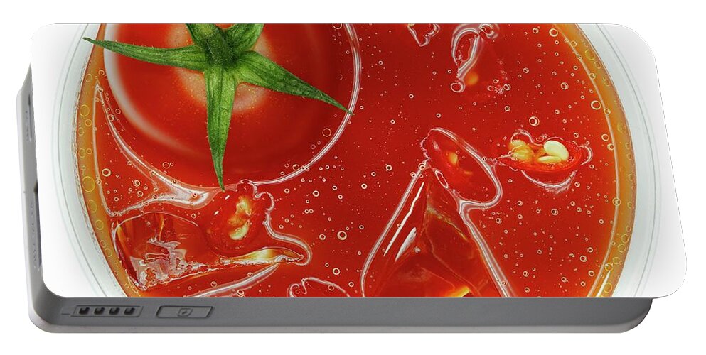 Ip_12263081 Portable Battery Charger featuring the photograph A Glass Of Bloody Mary With Ice And Tomato top View by Hermann Drre