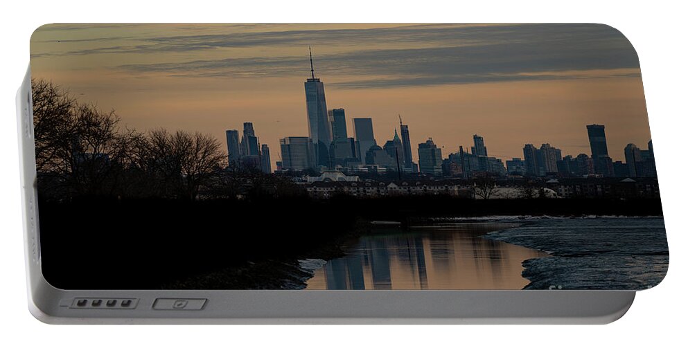 City Portable Battery Charger featuring the photograph A look at NY city at dusk from a nature preserve by Sam Rino