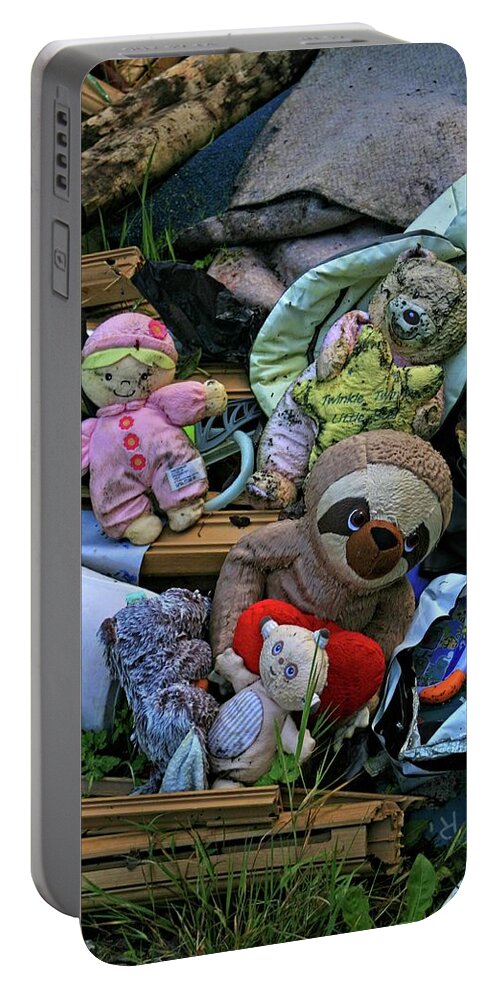 Abandoned Toys Portable Battery Charger featuring the photograph Abandoned toys by Martin Smith